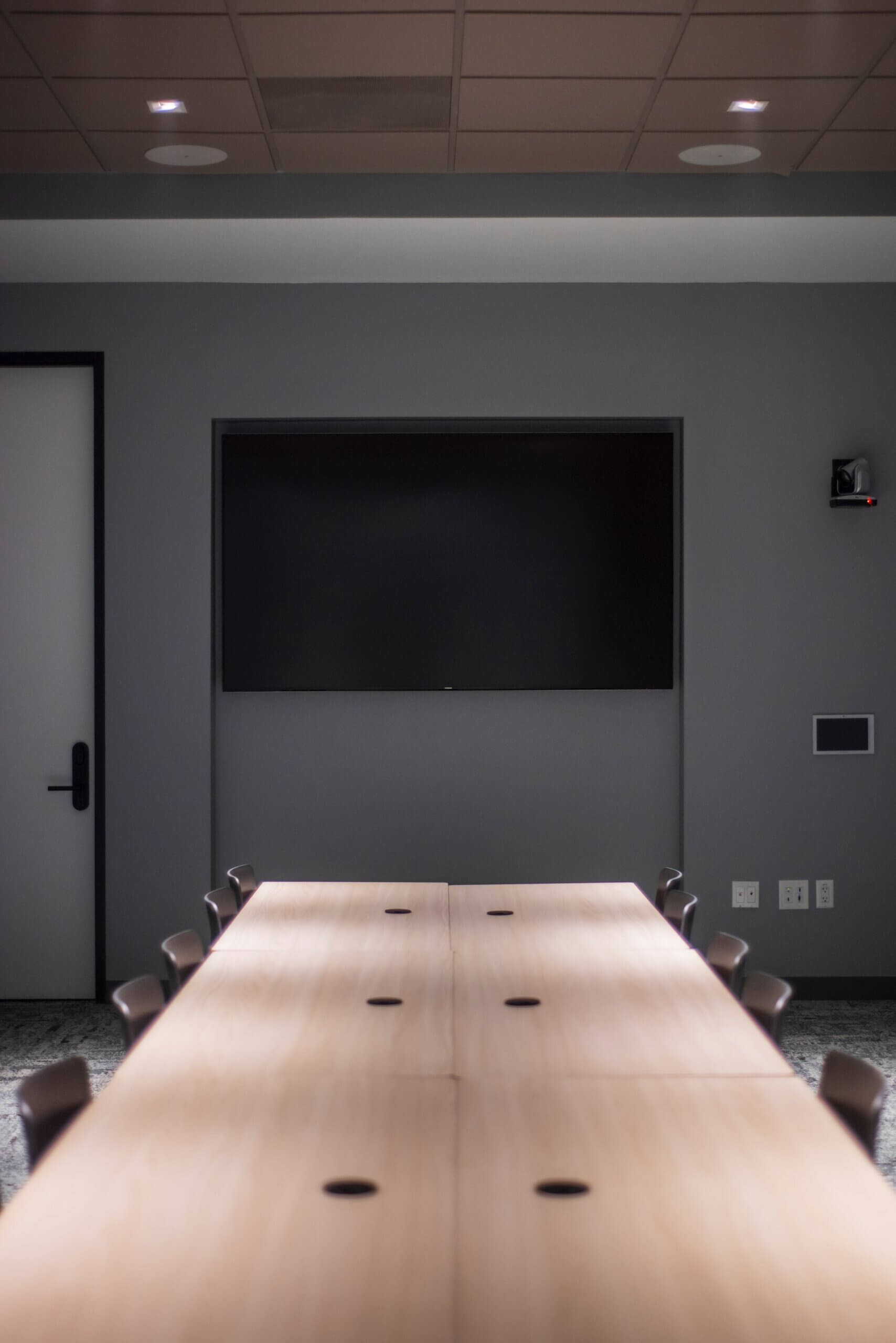 Empty boardroom with a TV