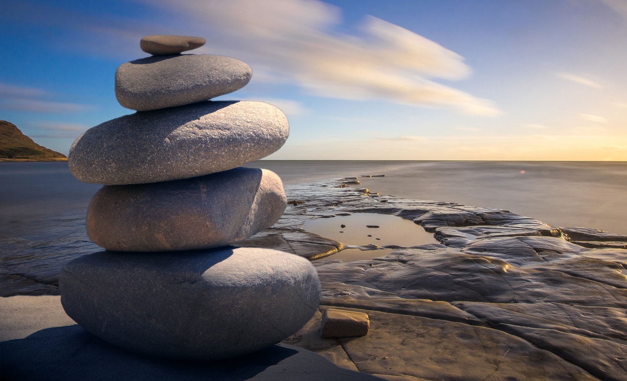 Spirituality: Uneven stones arranged on each other.