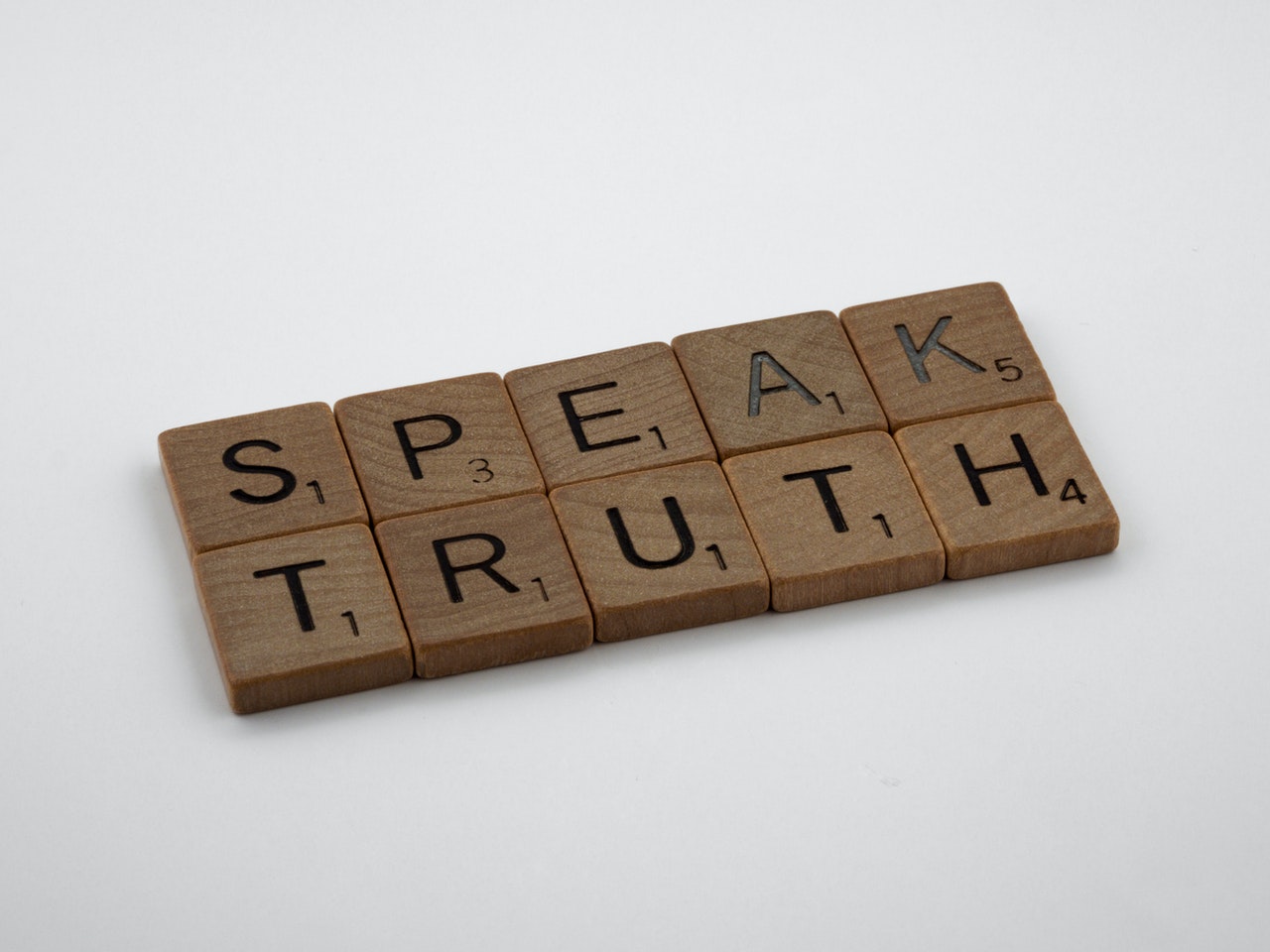 Speak truth written on wooden cubes