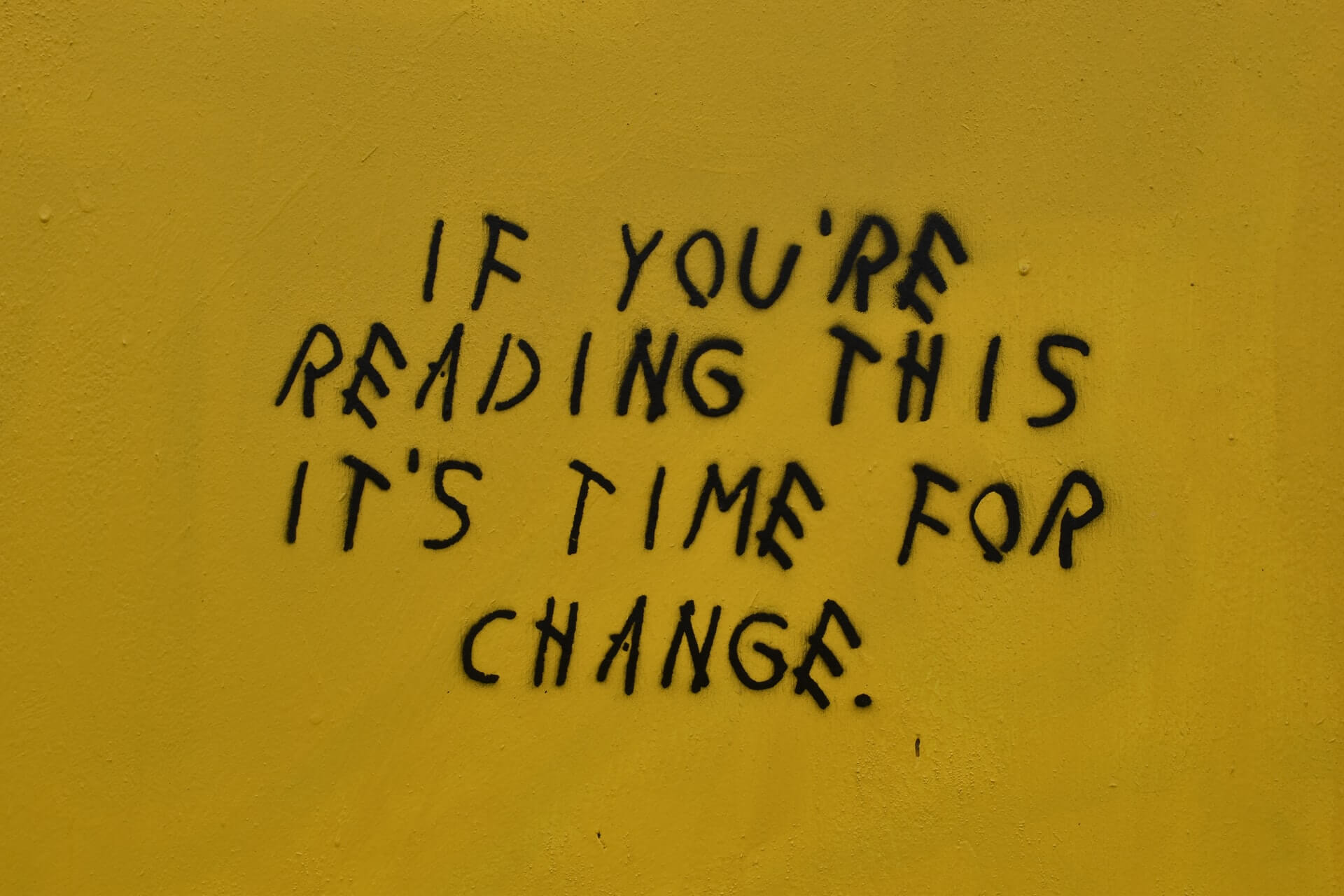 A quote on change on a yellow background