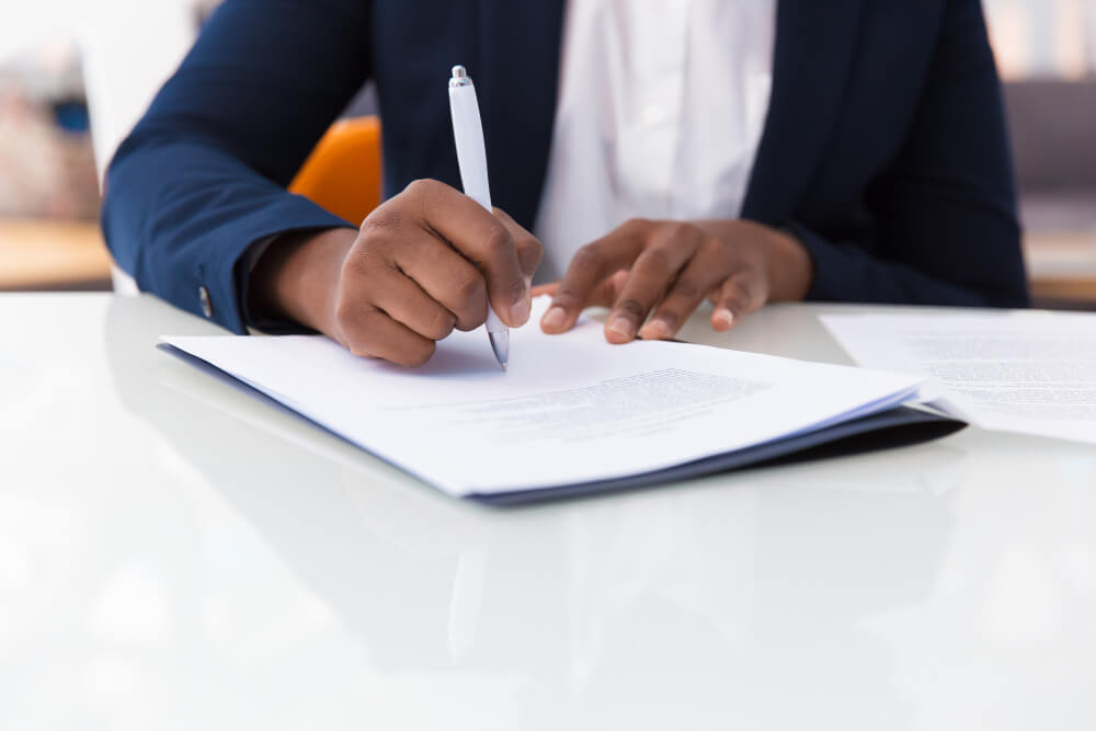 Businessman signing a business contract
