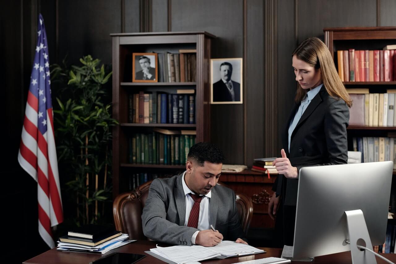 Lawyers in an office going through documents