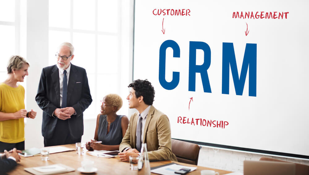 Group of businessmen discussing about CRM