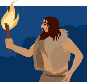 A-cave-man-holding-fire