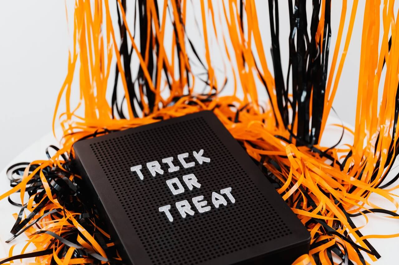 A-trick-or-treat-sign-on-a-white-background