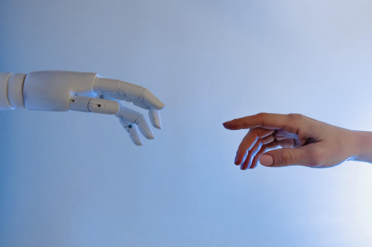 Person reaching out to robot