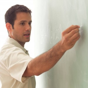 teacher-writing-on-a-white-board