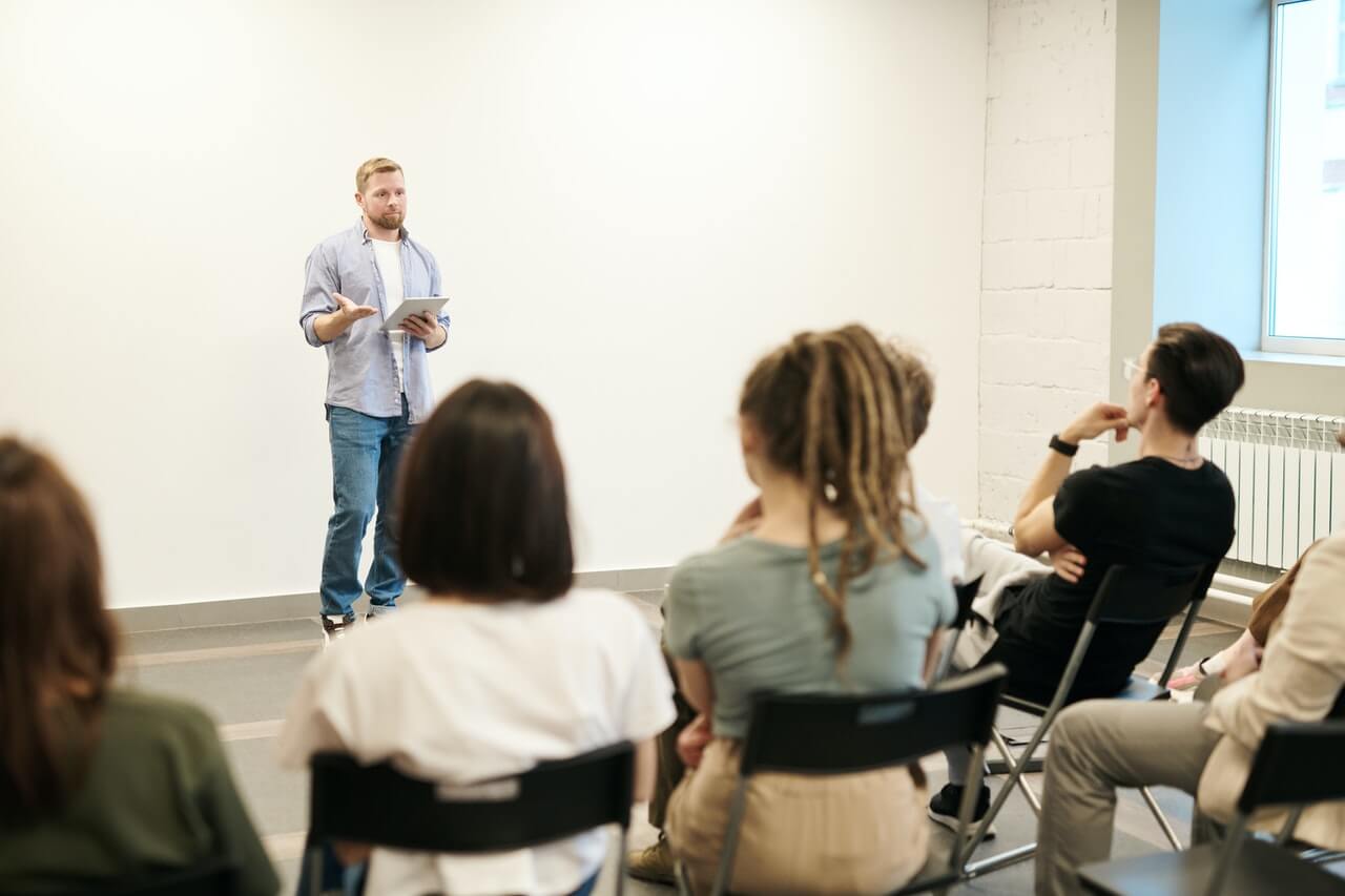 Man presenting to a focus audience