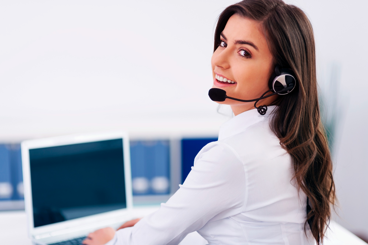 A-young-female-customer-care-service-provider-smiling-at-thecamera
