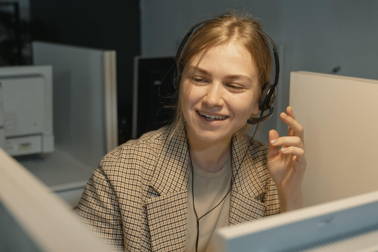 A-female-worker-on-a-call-with-a-client