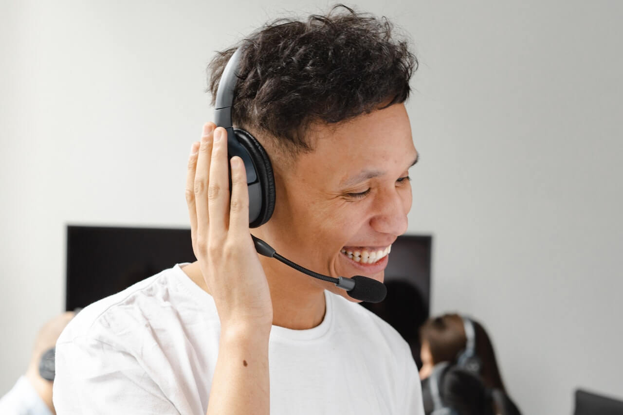 Smiling young man on headphones