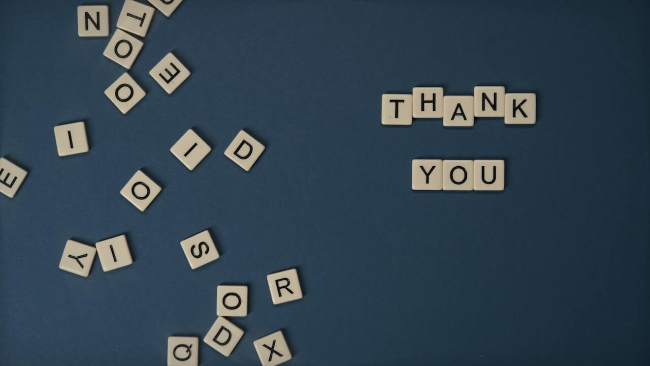 Letter tiles arranged to say "thank you"