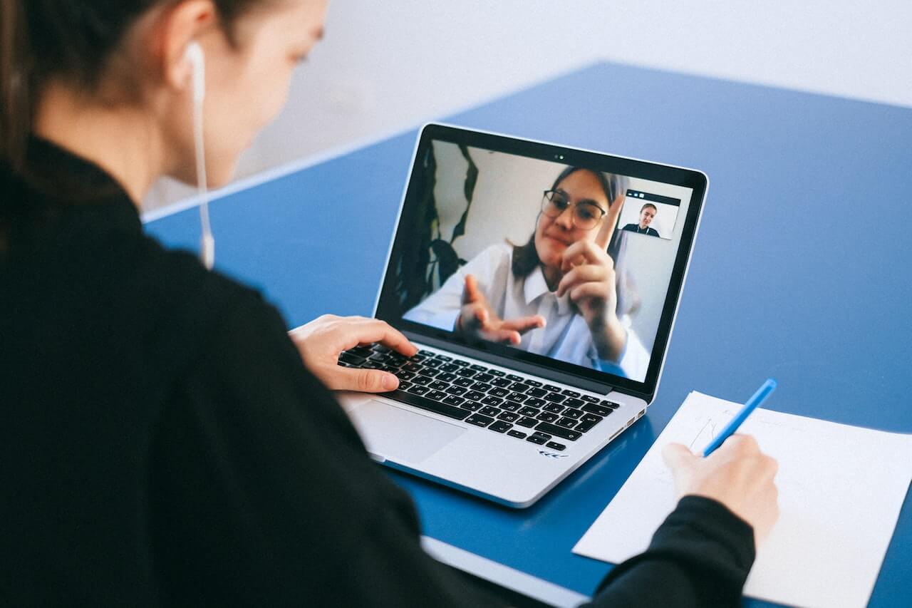 A lady learning through a video call