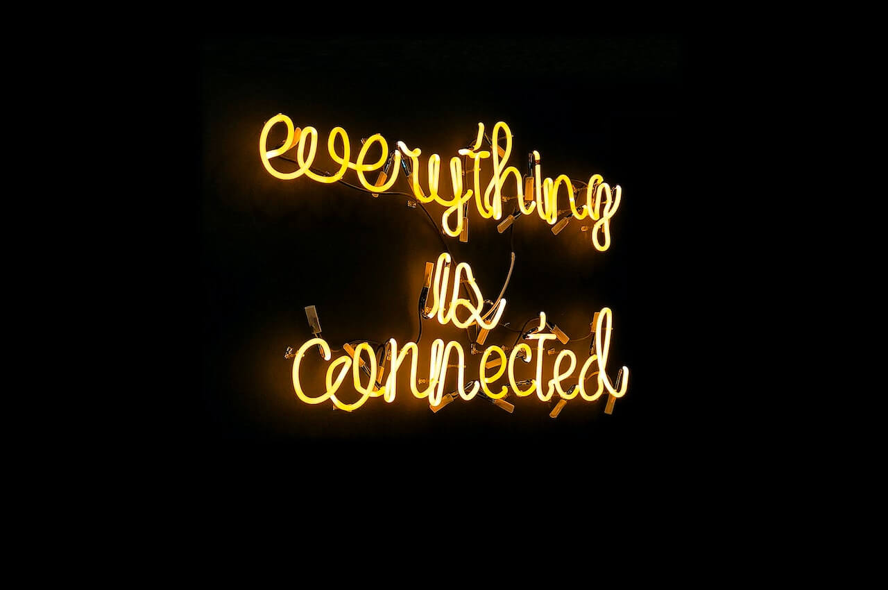 "Everything is connected" neon light signage
