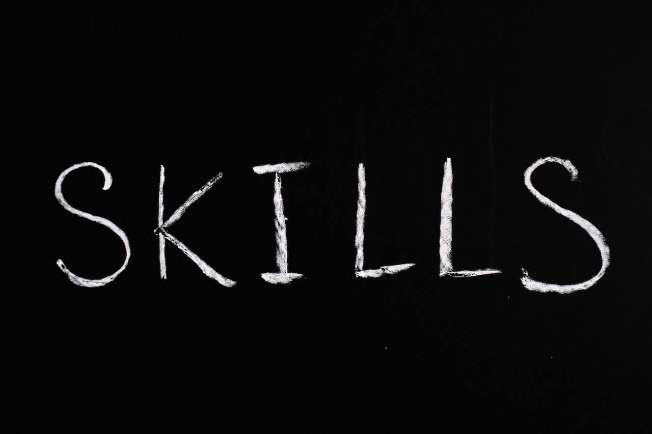 The text "skills" written on a black background