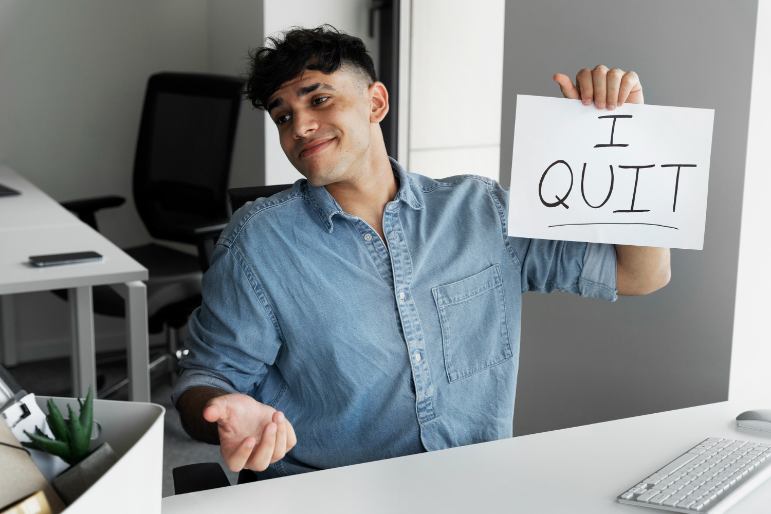 A man siling after giving a notice of quit