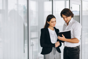 A consultant talking to a business woman