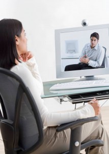 A-female-employee-having-a-webinar-with-a-colleague