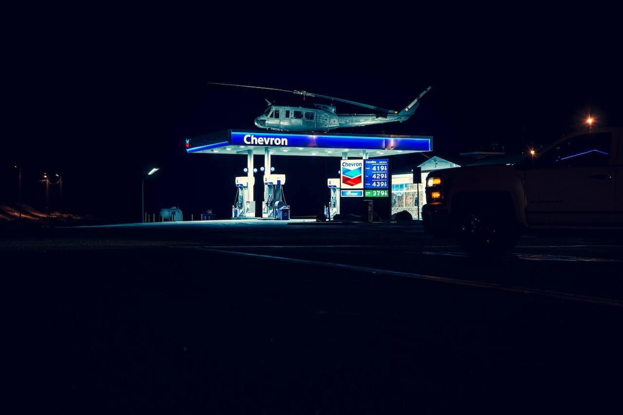 Helicopter on top of a chevron gasoline station