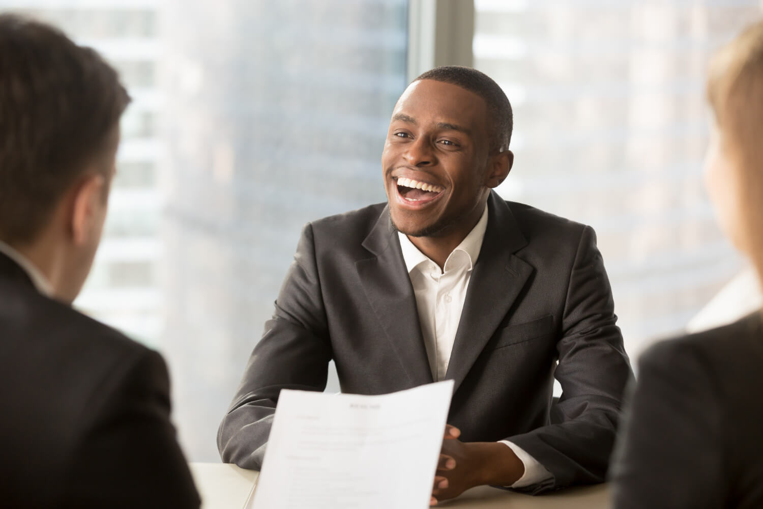 Successful-happy-black-male-candidate-getting-hired-got-job