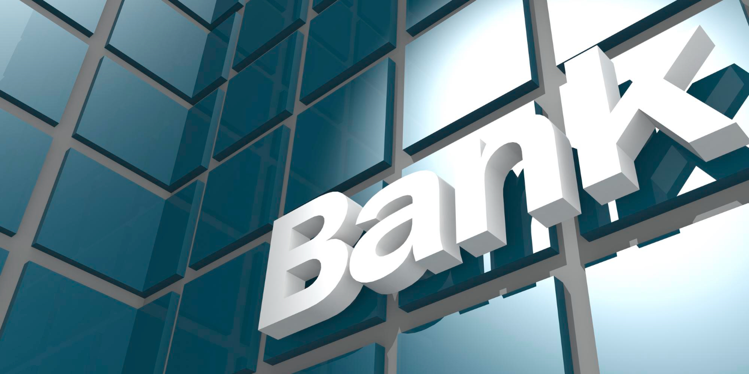 Building facade with bank sign on it